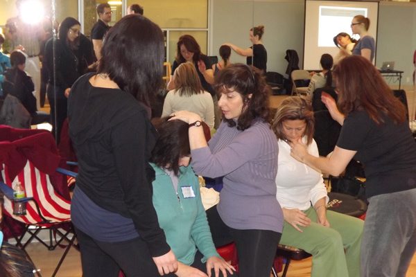 marjorie brook demonstrating stretching at seminar